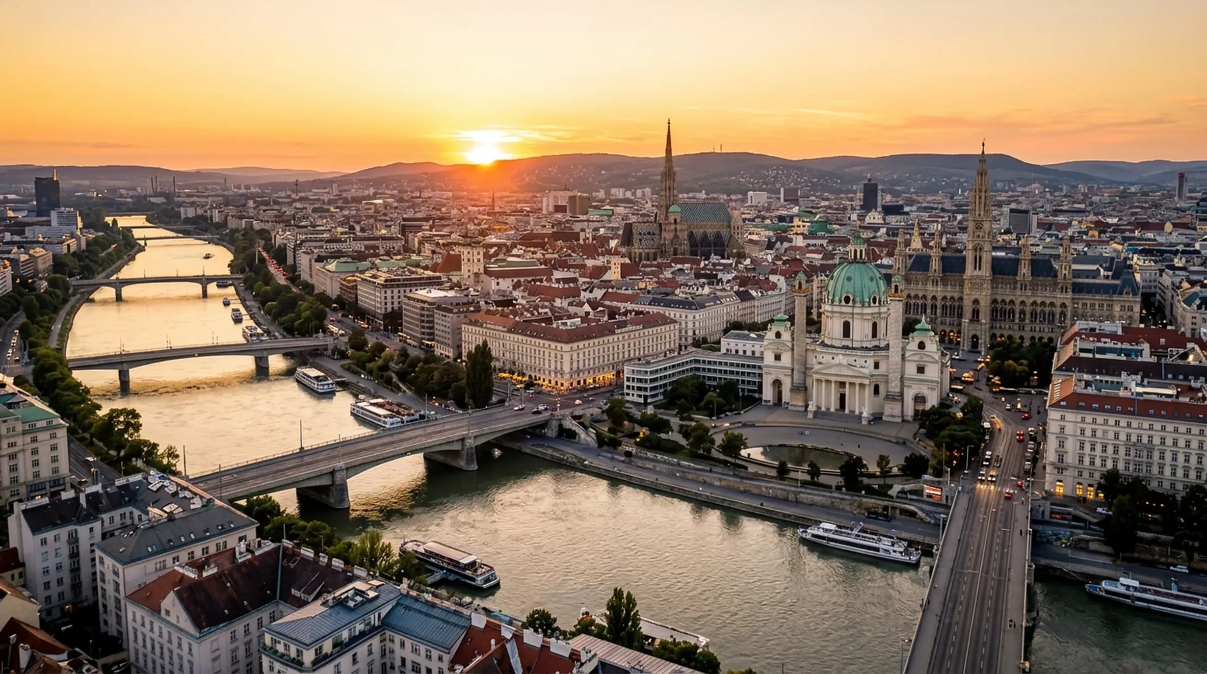 Central Vienna skyline and the Danube Canal at sunset
