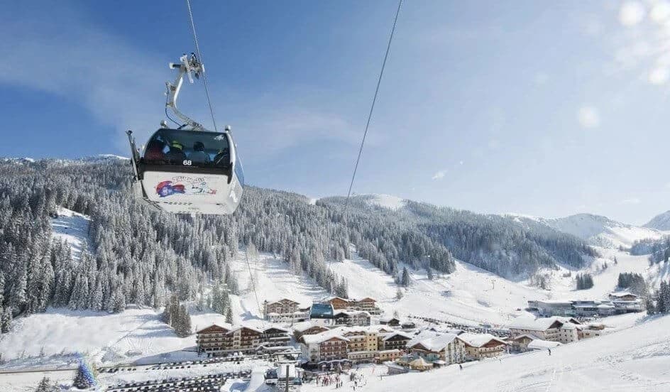 Zauchensee ski resort, gondola and snow-covered Alpine pistes