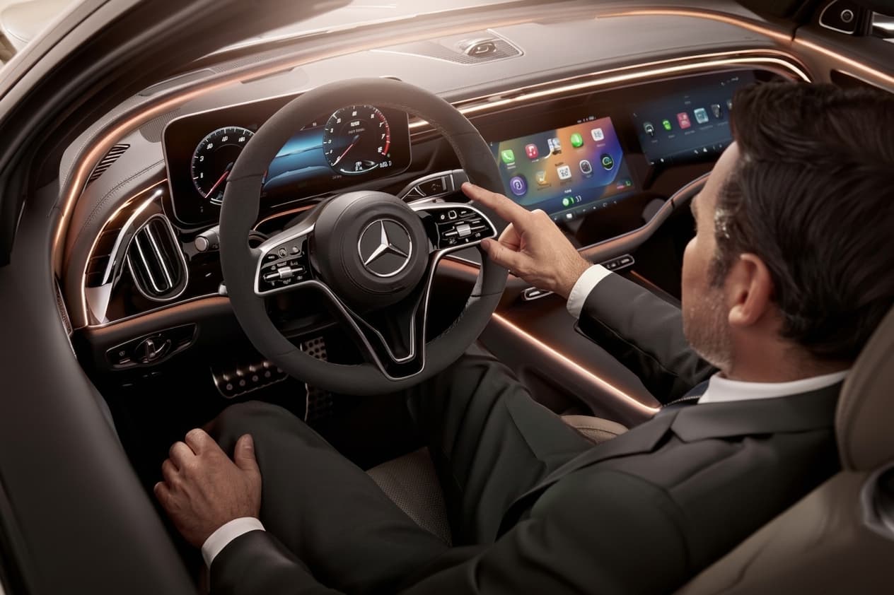 Professional chauffeur driving a premium transfer vehicle